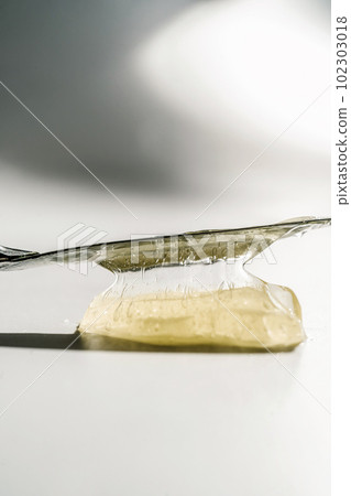 Transparent cosmetic gel on the white background. 102303018