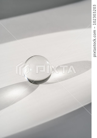 Transparent crystal ball on a white background. 102303203
