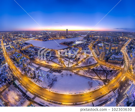 Winter Yekaterinburg and Temple on Blood in beautiful blue clear sunset. Aerial view of Yekaterinburg, Russia. Translation of the text on the temple Winter Yekaterinburg and Temple on Blood in beautiful blue clear sunset. Aerial view of Yekaterinburg, Russia. Translation of the text on the temple 102303630