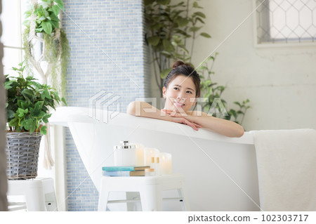 Female beauty Young woman taking a bath Female beauty Young woman taking a bath 102303717
