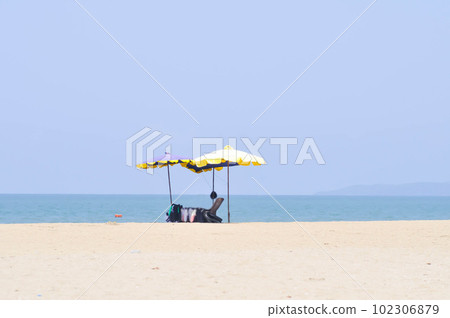 beach, sea and sun or sea background or parasol and beach 102306879