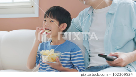 asian boy eat unhealthy food 102309524