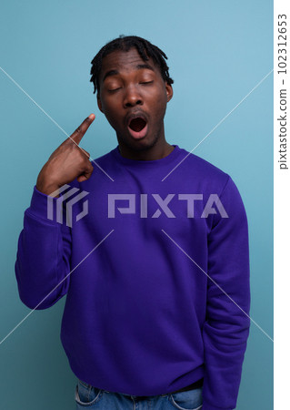 surprised american young man in blue sweatshirt 102312653
