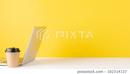 Laptop and coffee cup 102314137