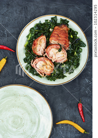 Chicken roll and fried spinach. Chicken roll and fried spinach. 102314295
