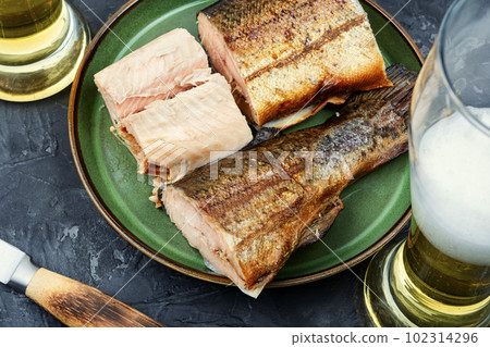 Smoked trout salmon and beer. Smoked trout salmon and beer. 102314296
