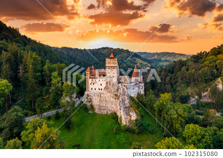 Bran Castle at sunset. The famous Dracula's castle in Transylvania, Romania Bran Castle at sunset. The famous Dracula's castle in Transylvania, Romania 102315080
