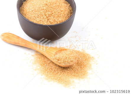 brown sugar in a spoon brown sugar in a spoon 102315619