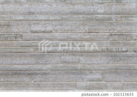 Gray stone wall texture 102315635