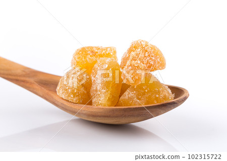 heap of sweat Candied ginger isolated on white 102315722