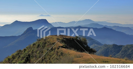 Stunning view from Ghale Gaun, Annapurna Conservation Area, Nepal. Hills and valleys on a fogy morning. 102316684