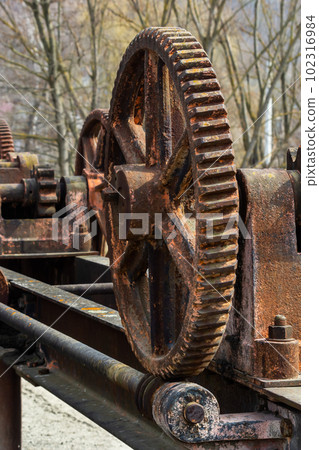 Separate metal elements of the gateways of the ancient dam of the mill 102316984