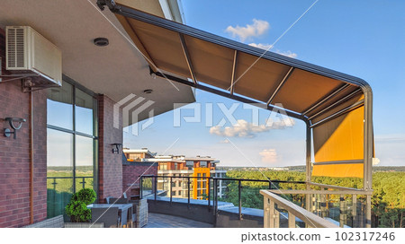 Awning on the terrace. Penthouse on the top floor with a terrace and a gorgeous view of the forest. Awning on the terrace. Penthouse on the top floor with a terrace and a gorgeous view of the forest. 102317246
