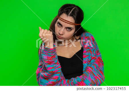Aggressive young woman trying to fight at camera, shaking fist, boxing with expression, punishment Aggressive young woman trying to fight at camera, shaking fist, boxing with expression, punishment 102317455