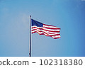 American flag in the blue sky of New York 102318380