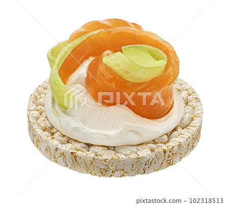 Puffed rice cake with smoked salmon isolated on white background Puffed rice cake with smoked salmon isolated on white background 102318513