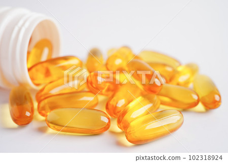 Fish oil or Cod liver oil gel in capsules with omega 3 vitamins, supplementary healthy food 102318924