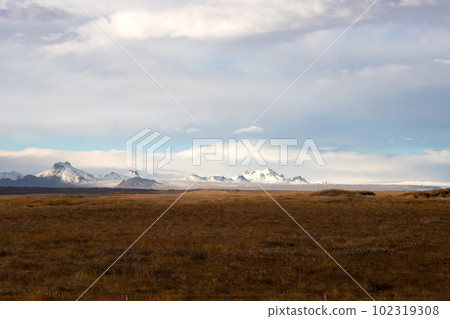 Autumn country and moutains with snow, Iceland 102319308