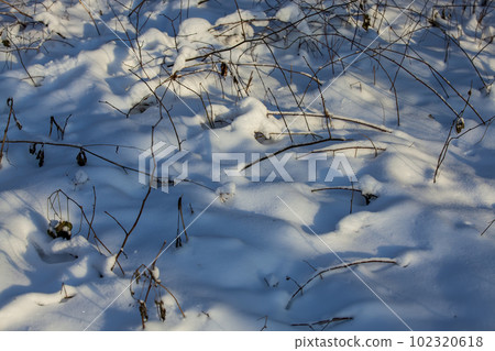 a large amount of snow in snowdrifts in winter a large amount of snow in snowdrifts in winter 102320618