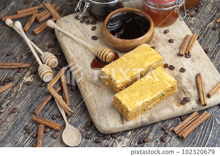 Sweet cake with lots of thin honey cakes 102320679