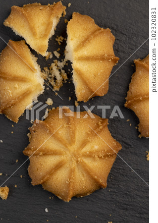 Crumbly shortbread cookies on the table 102320831