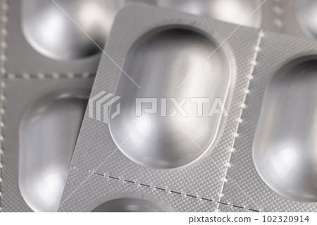 aluminum blister with medicines, close up 102320914
