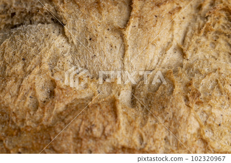 hard crisp crust of a freshly baked loaf of bread hard crisp crust of a freshly baked loaf of bread 102320967