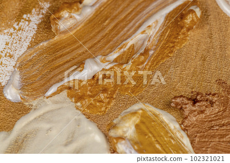 Abstract chaotic painting on canvas with gold paints Abstract chaotic painting on canvas with gold paints 102321021