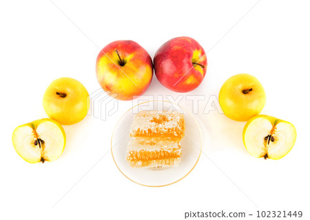 Apples and honeycomb isolated on a white background. 102321449