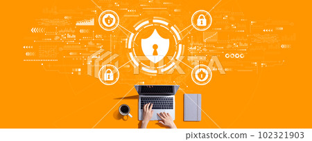 Cyber security theme with person working with laptop 102321903