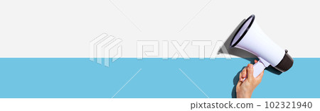 Attention and announcement concept with a megaphone 102321940