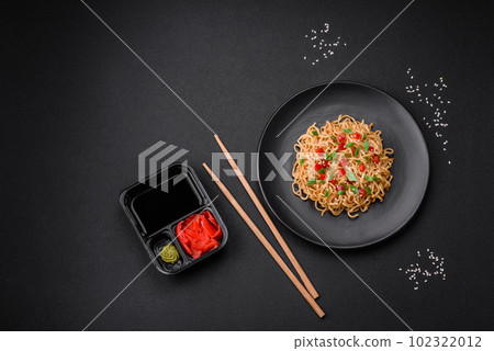 Delicious fresh Asian noodles with vegetables, salt, spices and herbs Delicious fresh Asian noodles with vegetables, salt, spices and herbs 102322012