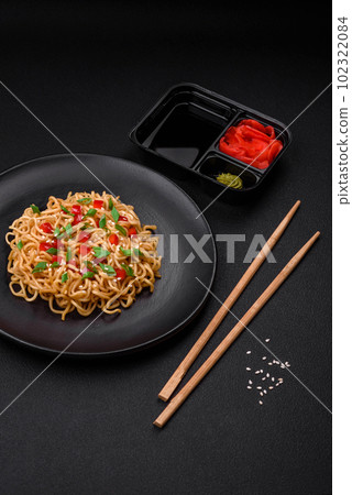 Delicious fresh Asian noodles with vegetables, salt, spices and herbs Delicious fresh Asian noodles with vegetables, salt, spices and herbs 102322084