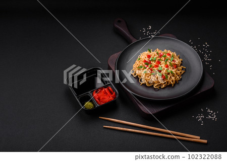 Delicious fresh Asian noodles with vegetables, salt, spices and herbs Delicious fresh Asian noodles with vegetables, salt, spices and herbs 102322088