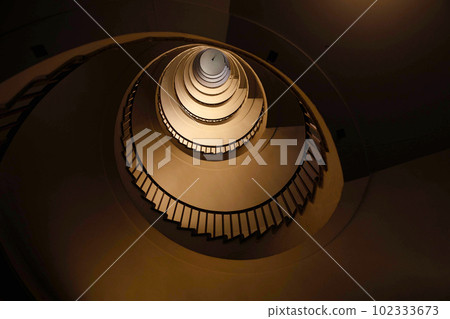 Spiral staircase in a tall multi-floor house, in the form of a "golden ratio", architecture, concept 102333673