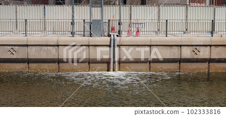 Dirty sewage from pipe, environmental pollution Dirty sewage from pipe, environmental pollution 102333816
