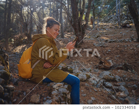 caucasian woman enjoys being in nature, caucasian woman enjoys being in nature, 102334058