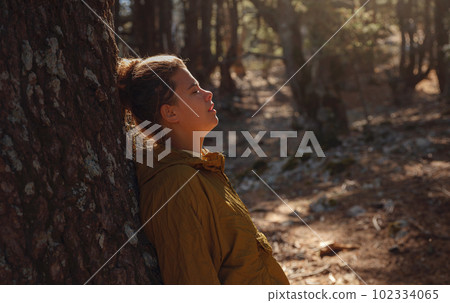 caucasian woman enjoys being in nature, caucasian woman enjoys being in nature, 102334065