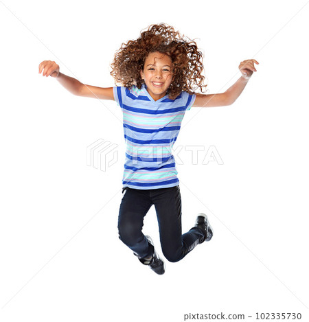 Tons of fun. Studio shot of a young girl jumping for joy against a white background. 102335730