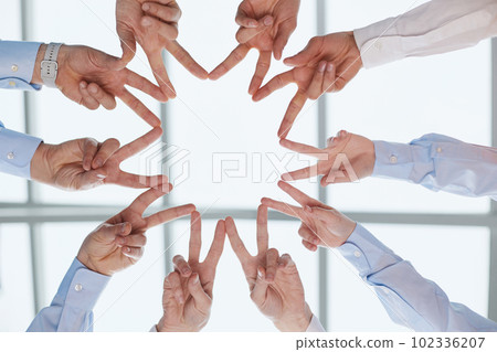 Star, shape and hands of business people with peace, team building motivation and below support. 102336207