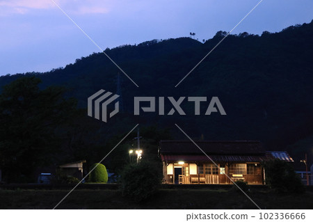 Rural station Inbi Line Mimasaka Takio Station lit up in the evening 102336666