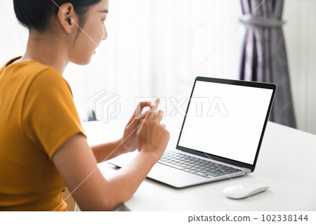 Woman hand working on laptop with blank copy space screen, mock-up for the application. Woman hand working on laptop with blank copy space screen, mock-up for the application. 102338144