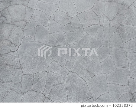 Horizontal background image of cracked light gray concrete wall Horizontal background image of cracked light gray concrete wall 102338373