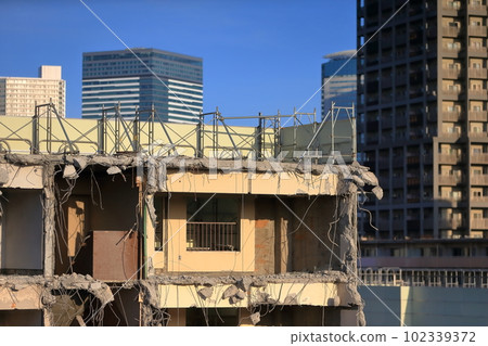 An image of a housing complex building being demolished An image of a housing complex building being demolished 102339372