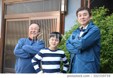 A family (3 men) is comparing greatness A family (3 men) is comparing greatness 102339739