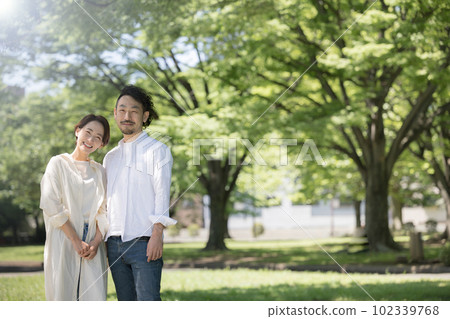 An image of a happy couple or married couple Bearded man and beautiful woman An image of a happy couple or married couple Bearded man and beautiful woman 102339768