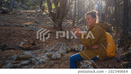 caucasian woman enjoys being in nature, 102340664