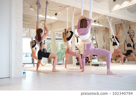 workshop of air yoga and stretching in yoga studio 102340794
