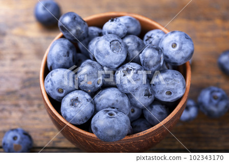 Freshly picked blueberries in bowl. Freshly picked blueberries in bowl. 102343170