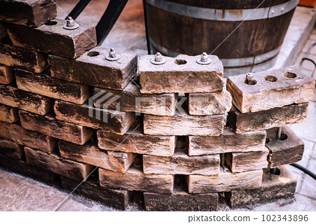 Scenery of stylish enclosure with bricks piled up outdoors 102343896